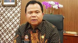 Dr. Ronny F. Sompie, S.H.,M.H