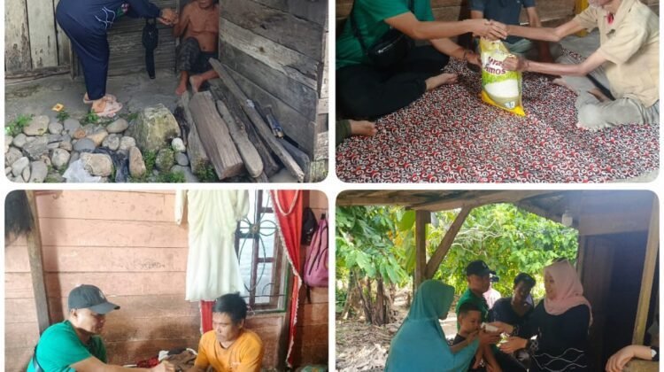 R Bayu Saat Memberikan Bantuan di rumah Warga Kurang mampu desa Pulo Ndadap.