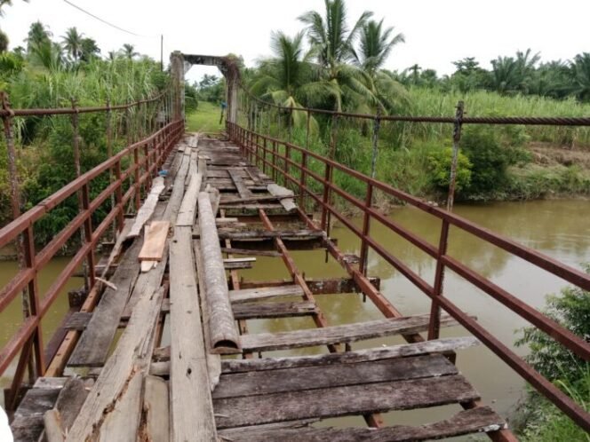 
					Jembatan Gantung Peninggalan Exxon di Aceh Utara Rusak Parah, Warga Minta PUPR Segera Bertindak